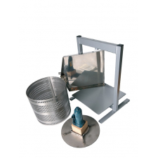 Large steel fruit press broken down into its parts.