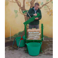 Man securing metal frame of pack press.