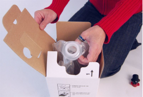 Demonstration of packing 5 litre bag into box