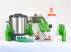 Image of all the items included with the Superior Apple Juice Kit including Pasteuriser and Glass Bottles