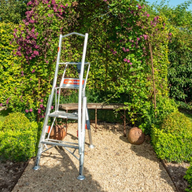 5 foot Henchman tripod ladder with 3 adjustable legs in garden